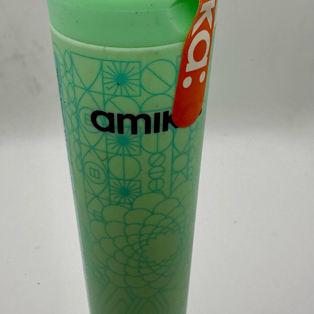 Amika Green Shampoo Bottle